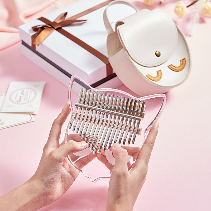 Transparent crystal thumb piano