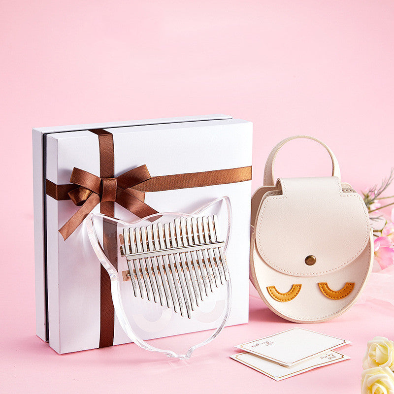 Transparent crystal thumb piano