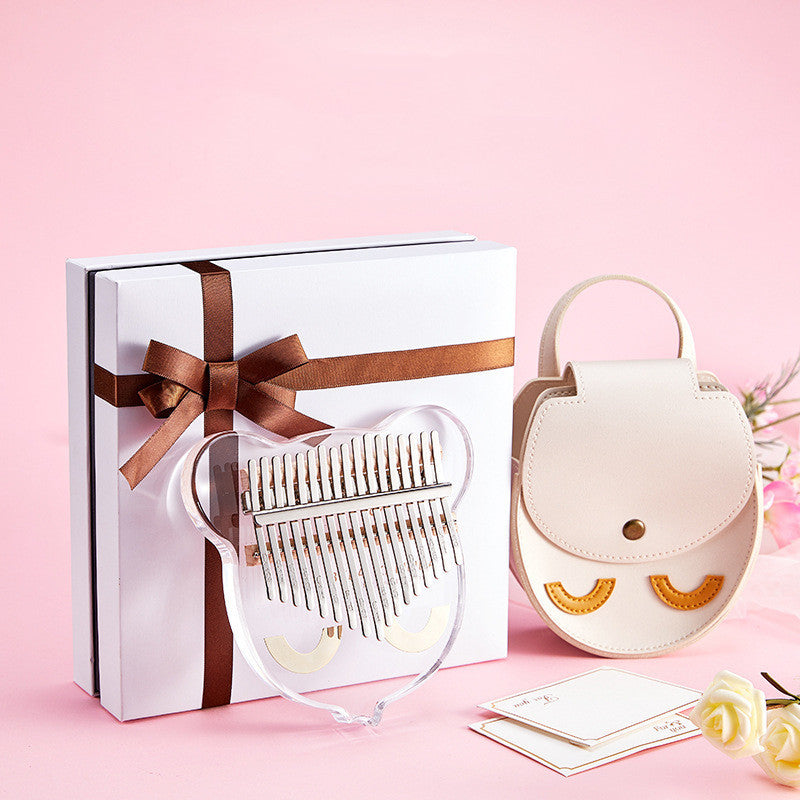 Transparent crystal thumb piano